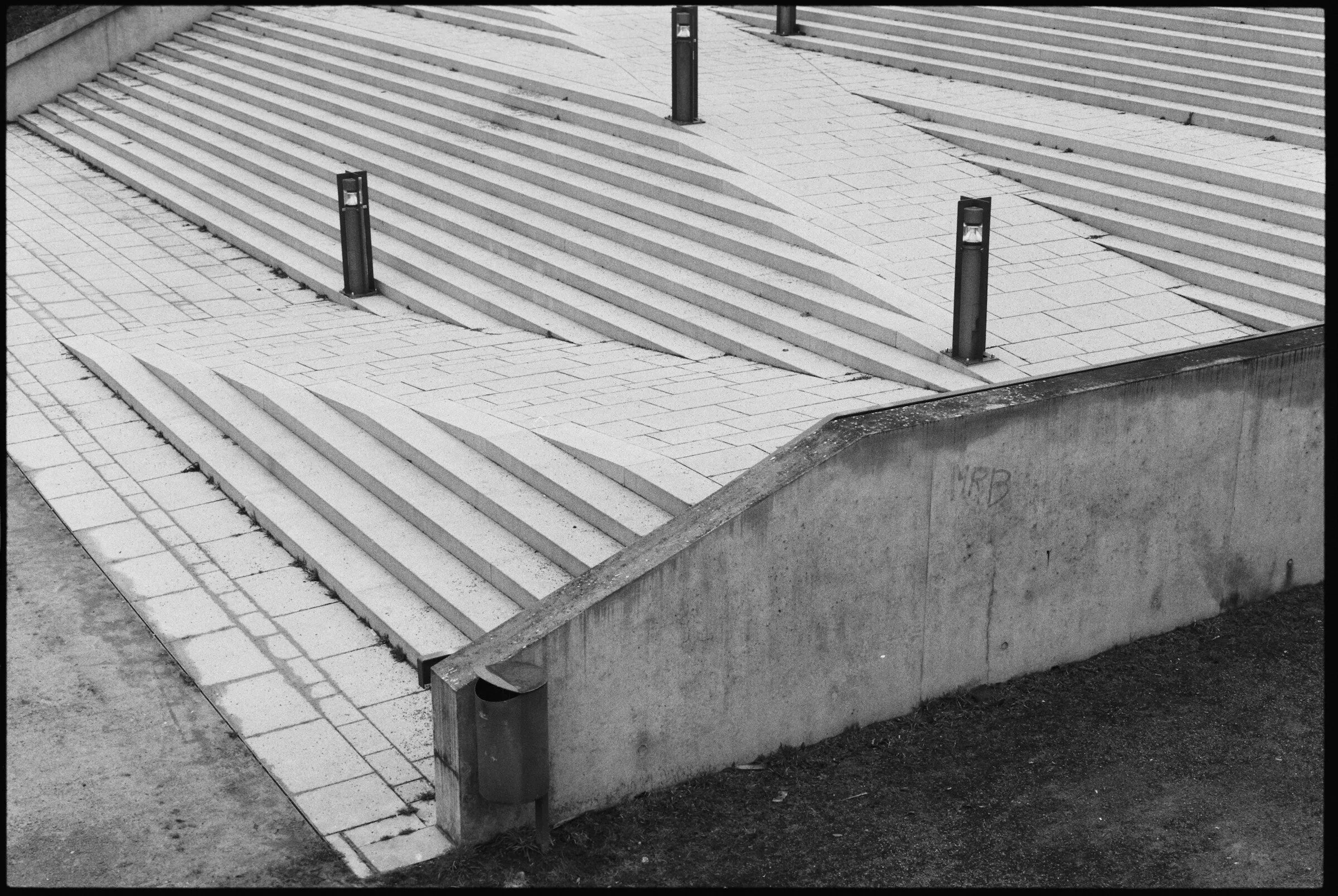 Concrete steps with path lights, photographed in black and white